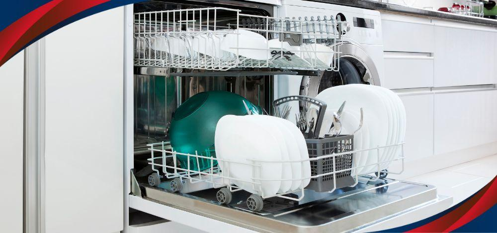 A Whirlpool dishwasher in the Philippines with clean utensils and plates