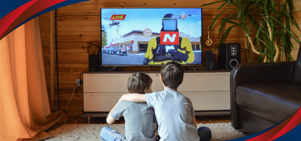 Two children watching from an OLED TV available in the Philippines